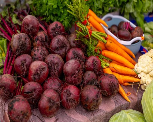 A variety of fresh seasonal vegetables like beets and carrots gathered from a local market in Poland